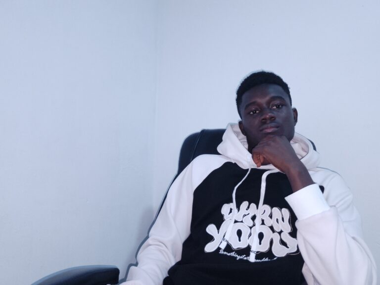 a portrait of Ghanaian blogger, Scam buster and IT professional Yhang Mhany